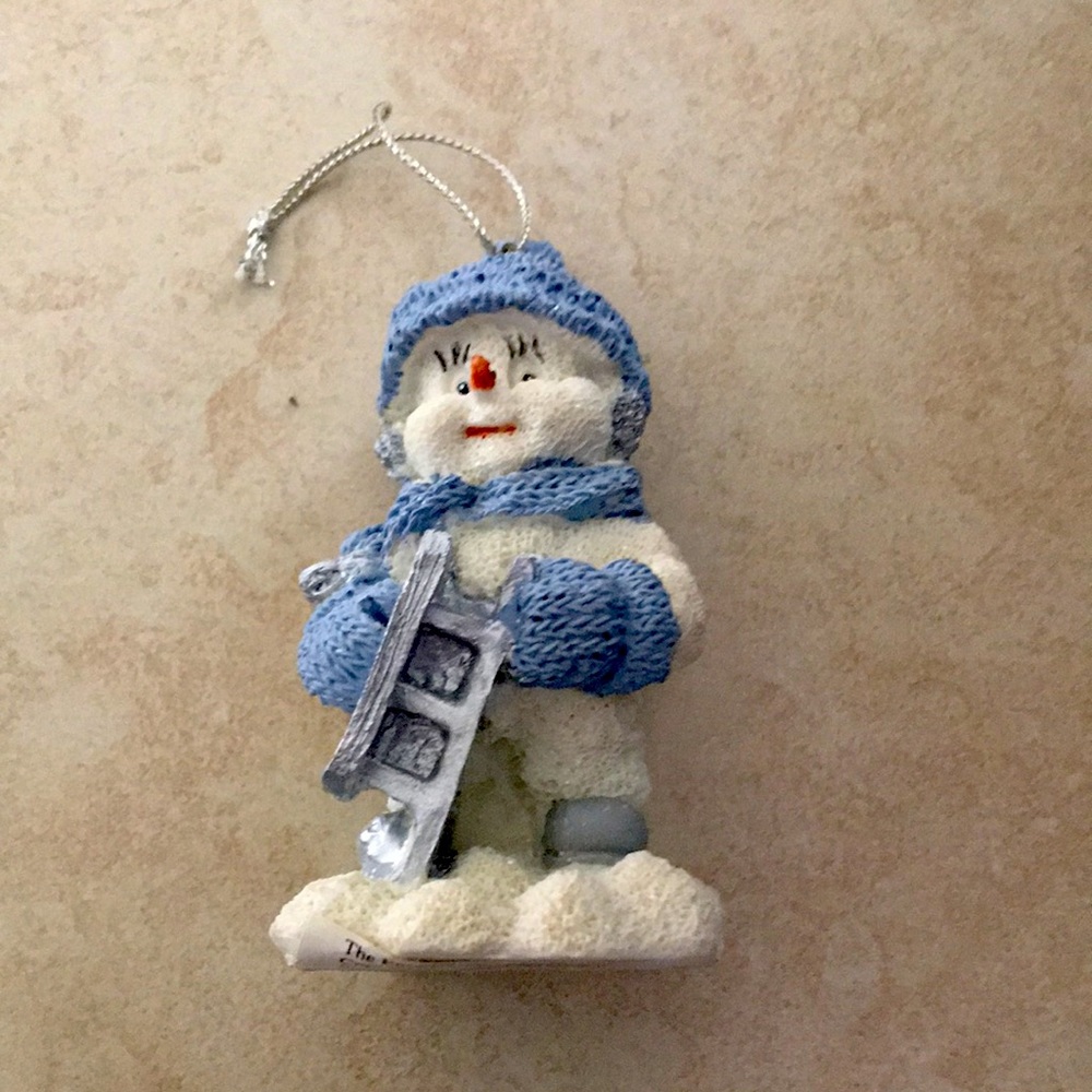 Buddy the Snowman with candy cane Xmas ornament